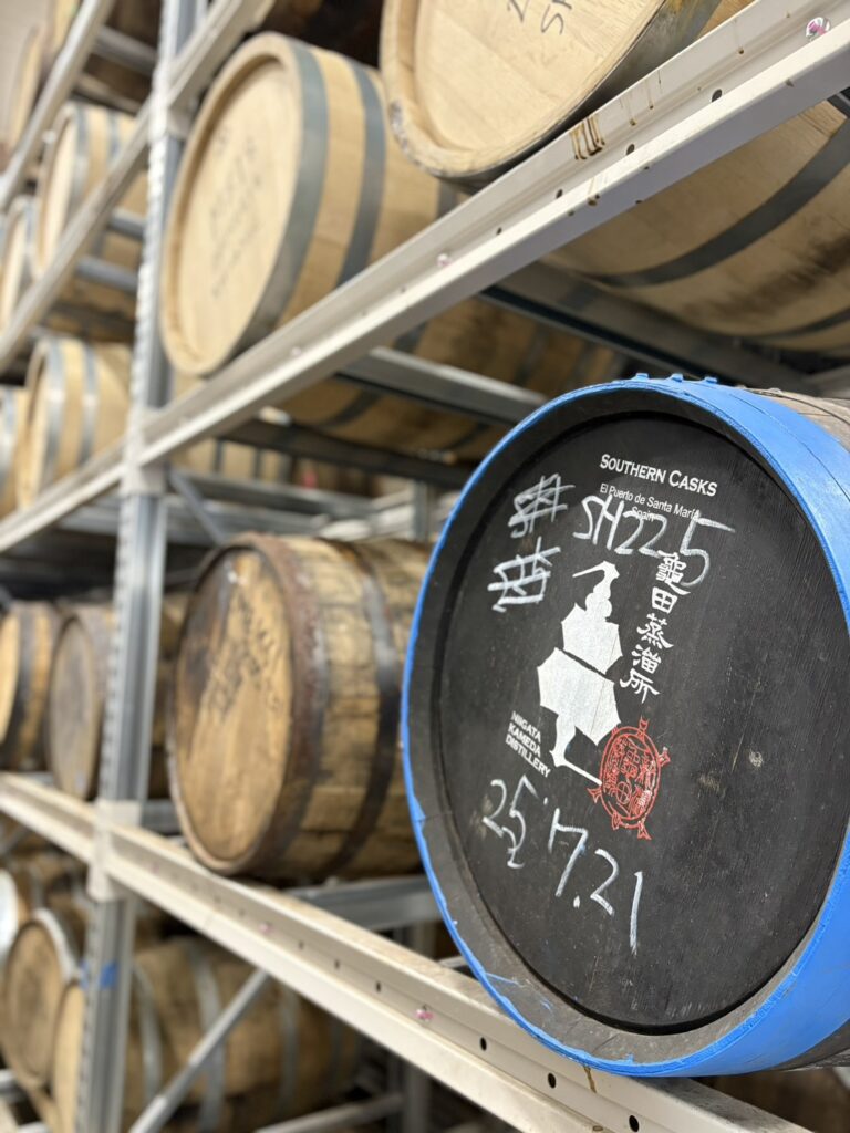 apanese whisky expert Mika Tanimoto exploring the maturation warehouse at Kameda Distillery in Niigata, where 'beautiful' spirits age in barrels.