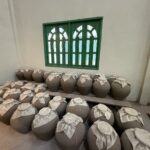 The traditional clay pot storage room at LAODI Distillery in Laos, where the initial batches of rum were aged, explored by expert Mika Tanimoto."