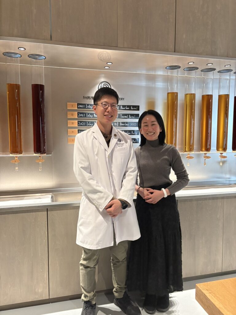 apanese whisky expert Mika Tanimoto with the Chief Blender of Saburomaru Distillery in the private blending sanctuary, discussing the 'Amber Puzzle' of Japanese whisky.