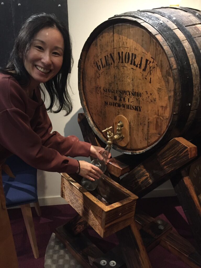 Japanese Whisky Expert Mika Tanimoto experiencing a hand-fill session at Glen Moray Distillery in Speyside, Elgin, to bring a rare bottle to Hiroshima.